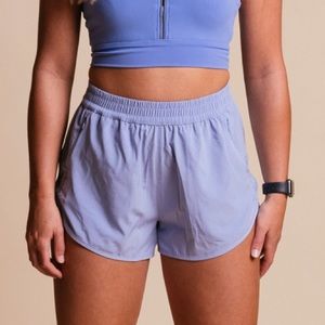 P’tula training shorts in periwinkle size medium NWT